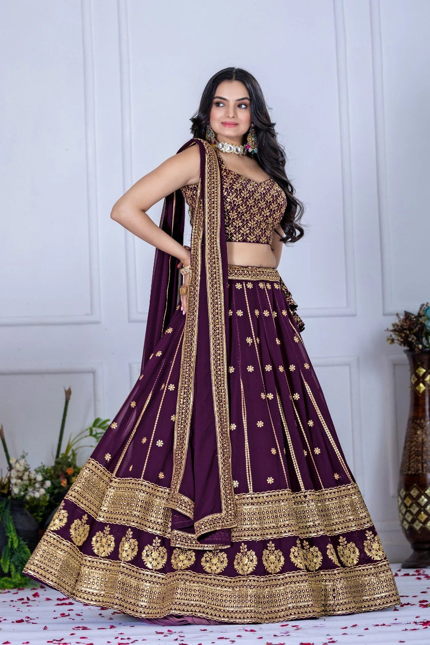 Woman wearing a purple and gold traditional outfit with a white background
